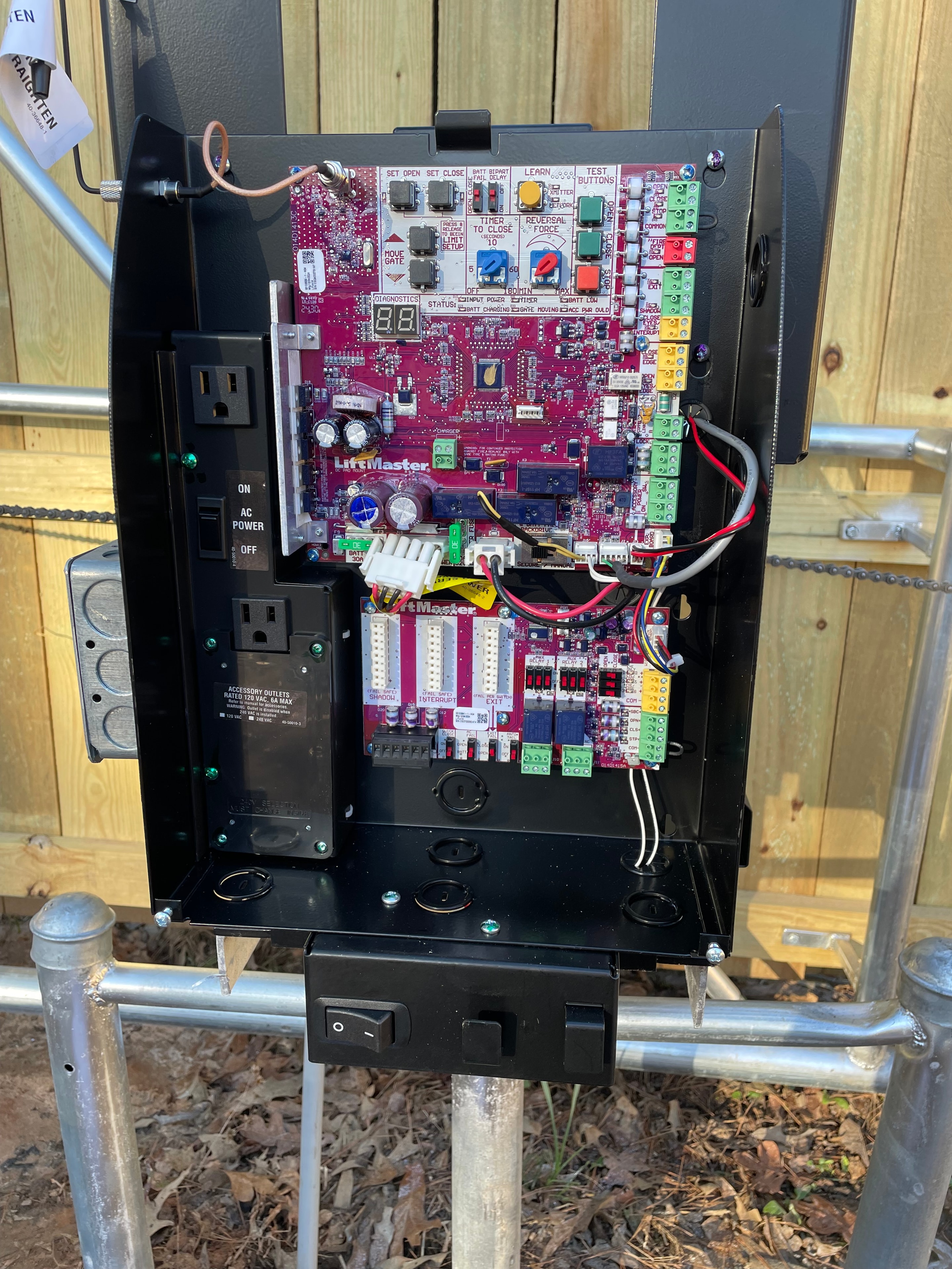 LiftMaster commercial gate operator control board installed by Fortified Fence and Weld — Alexandria, Louisiana
